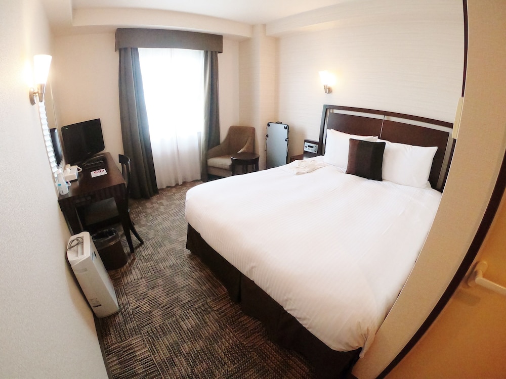 デラックス ダブルルーム 禁煙 客室1 | ソルヴィータホテル那覇
