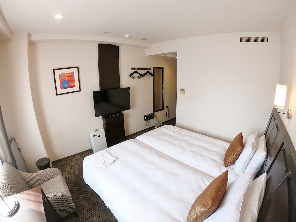 エコノミー ツインルーム シングルベッド 2 台 客室3 | ソルヴィータホテル那覇