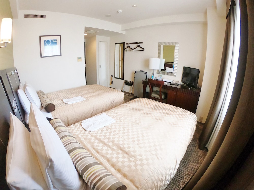 スタンダード ツインルーム 喫煙可 客室1 | ソルヴィータホテル那覇