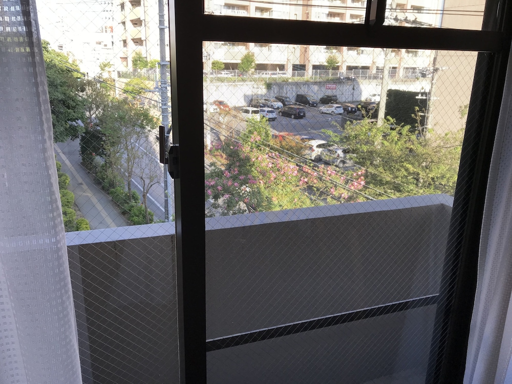 ツインルーム ダブルベッド バルコニーからの眺望0 | ウィークリー ハーバービュー マンション - メイン ビルディング