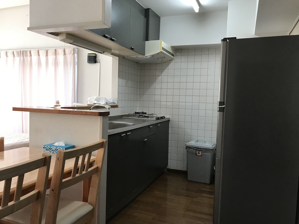 ファミリーツインルーム ダブルベッド 専用キッチン0 | ウィークリー ハーバービュー マンション - メイン ビルディング