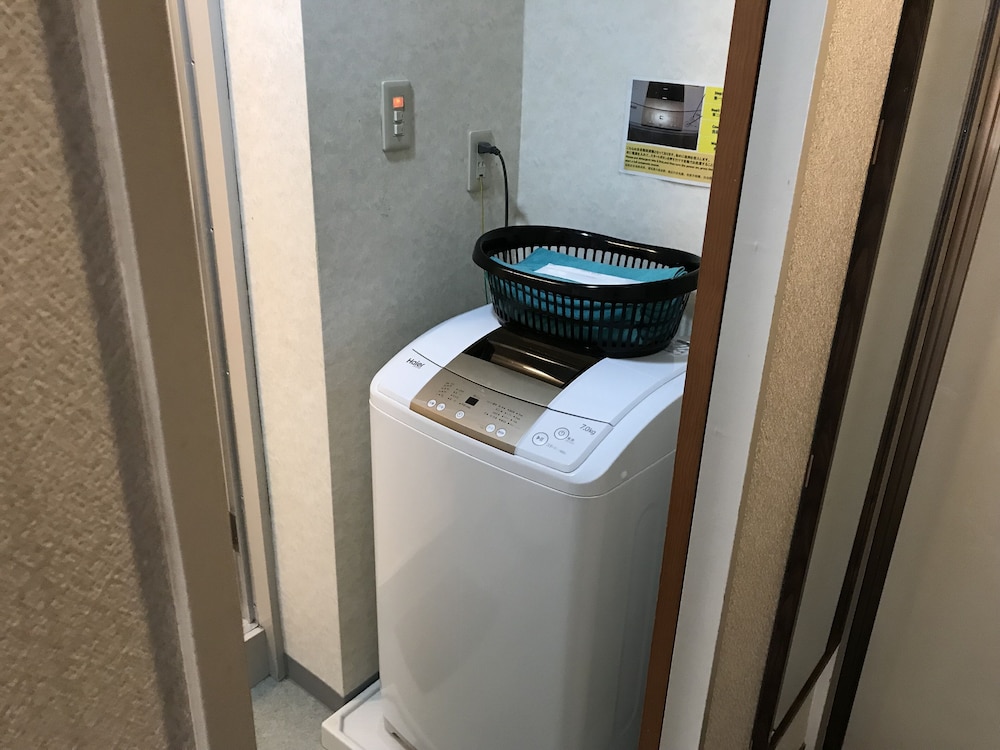 ファミリーツインルーム ダブルベッド ランドリー0 | ウィークリー ハーバービュー マンション - メイン ビルディング