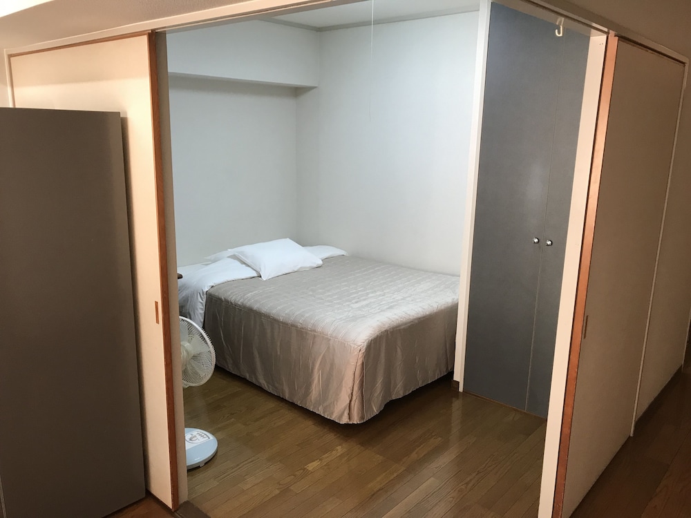 ファミリーツインルーム ダブルベッド 客室1 | ウィークリー ハーバービュー マンション - メイン ビルディング