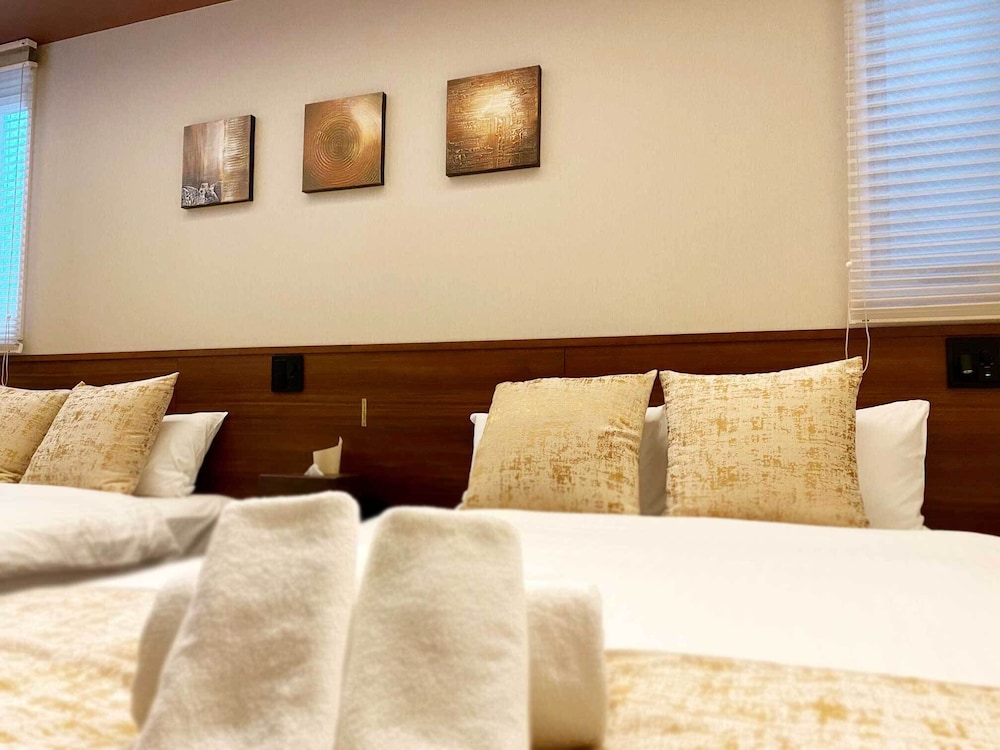 デラックス ファミリールーム (102)(ソファベッド用の寝具は部屋に常備していない為 事前にリクエストが必要) 客室3 | ホテルクラス広島 大州