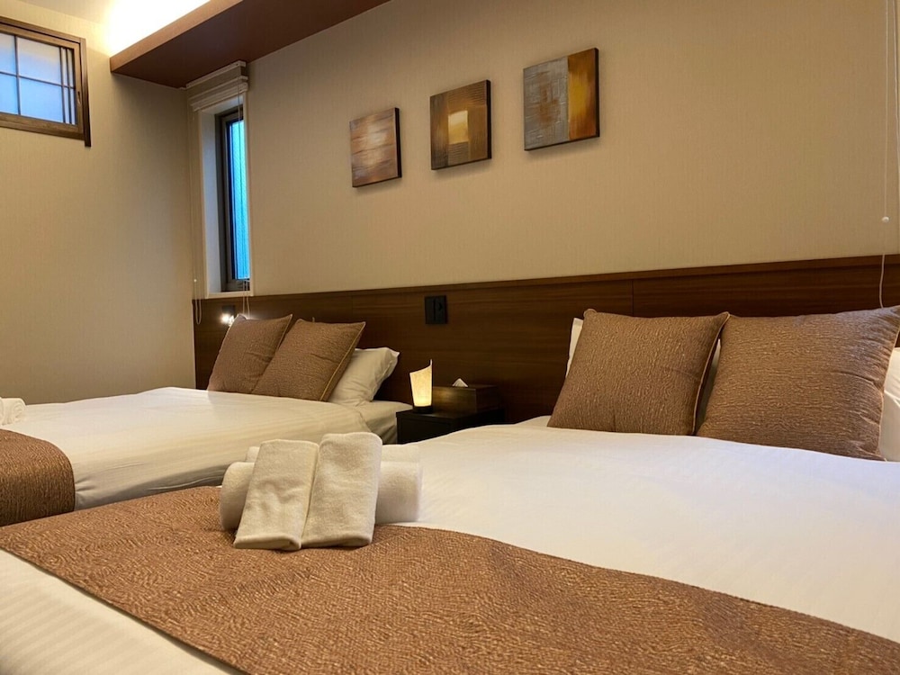 デラックス ファミリールーム (202)(ソファベッド用の寝具は部屋に常備していない為 事前にリクエストが必要) 客室5 | ホテルクラス広島 大州