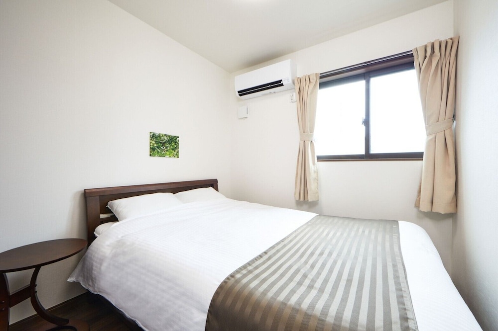2ベッドルーム 客室1 | E-horizon Resort コンドミニアム名護 E