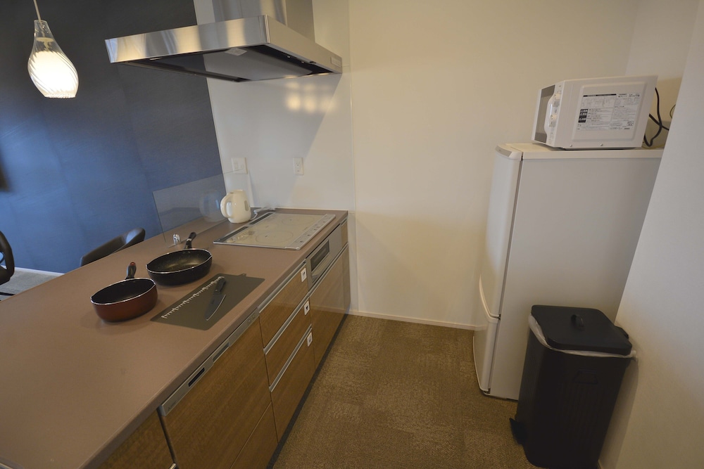 プライベート ルーム 専用キッチン1 | The Grand Residence Hotel Tenjin