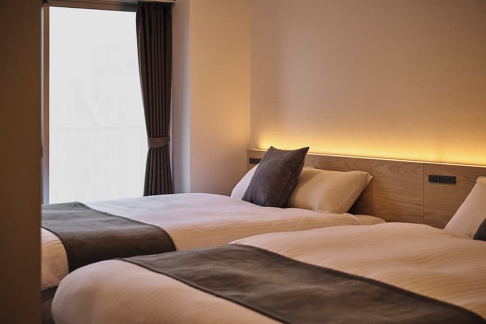 ツインルーム 客室1 | The Grand Residence Hotel Tenjin