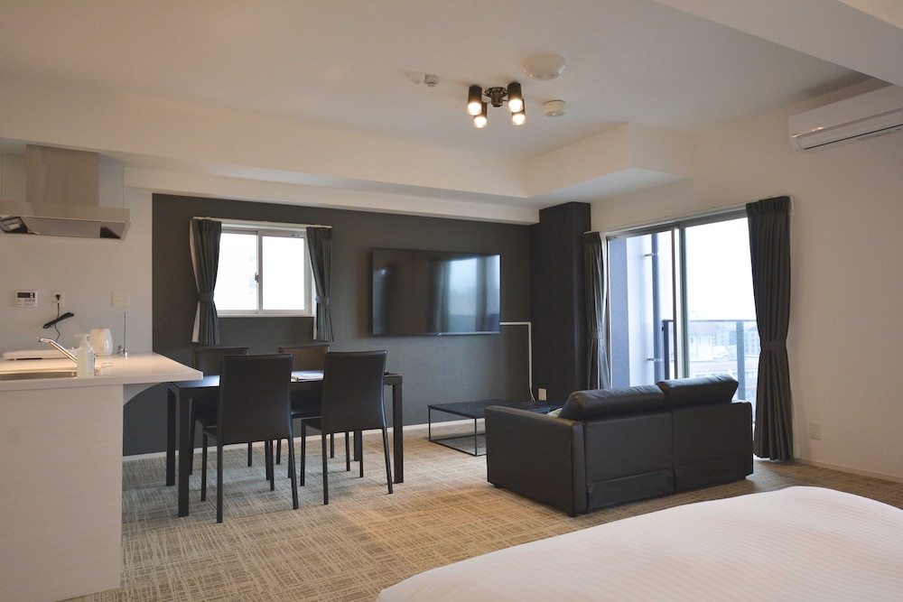 デラックス ルーム リビング エリア0 | The Grand Residence Hotel Tenjin