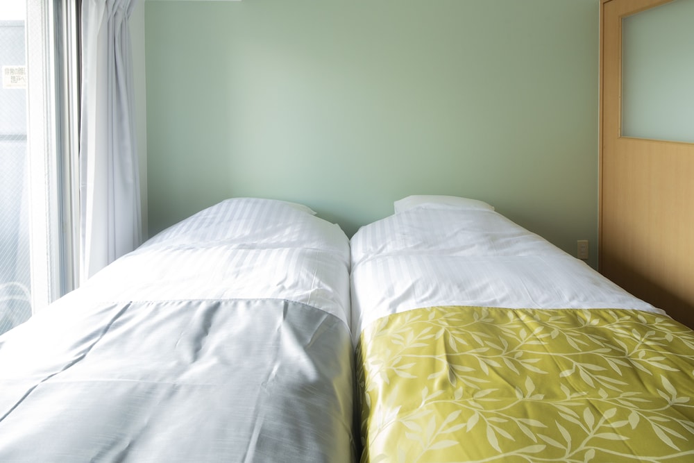 ツインルーム 客室2 | Coruscant Hotel 長崎駅