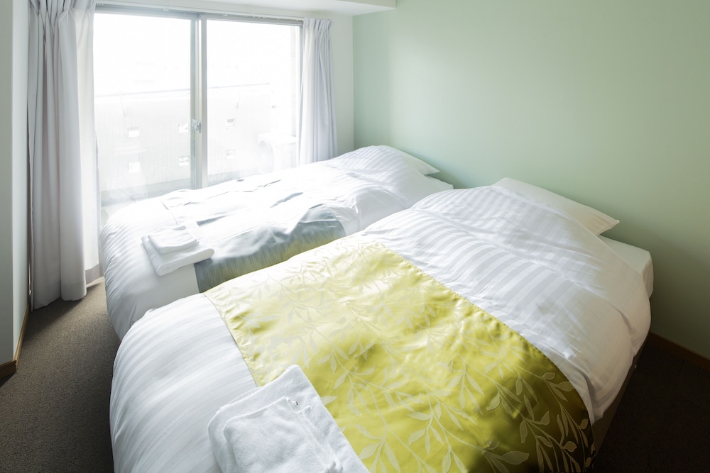 ツインルーム 客室1 | Coruscant Hotel 長崎駅