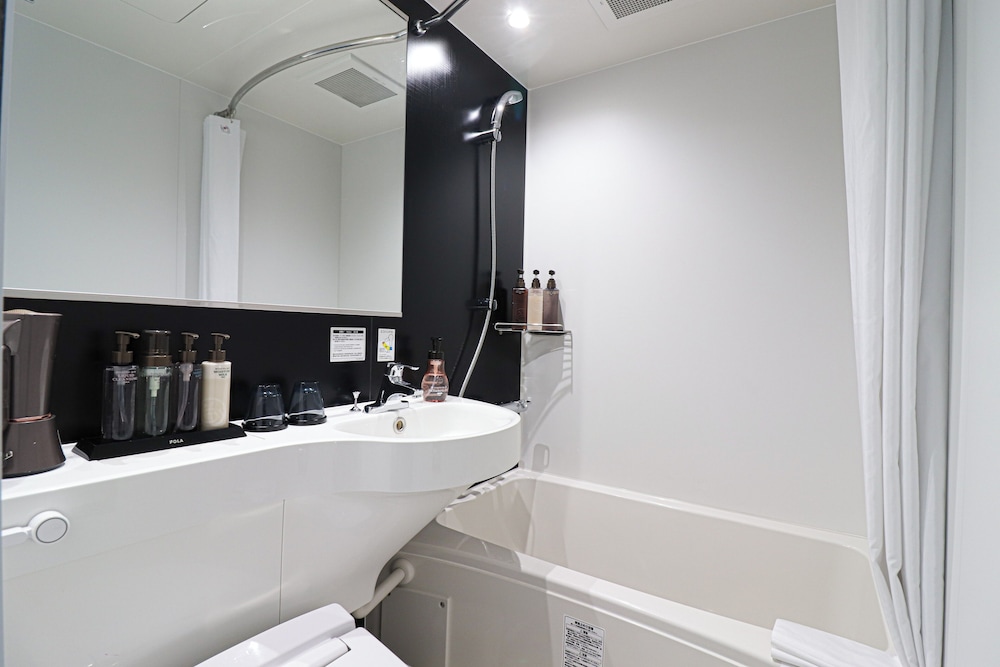 スタンダード ツインルーム シングルベッド 2 台 バスルーム0 | 日和ホテル大阪新世界