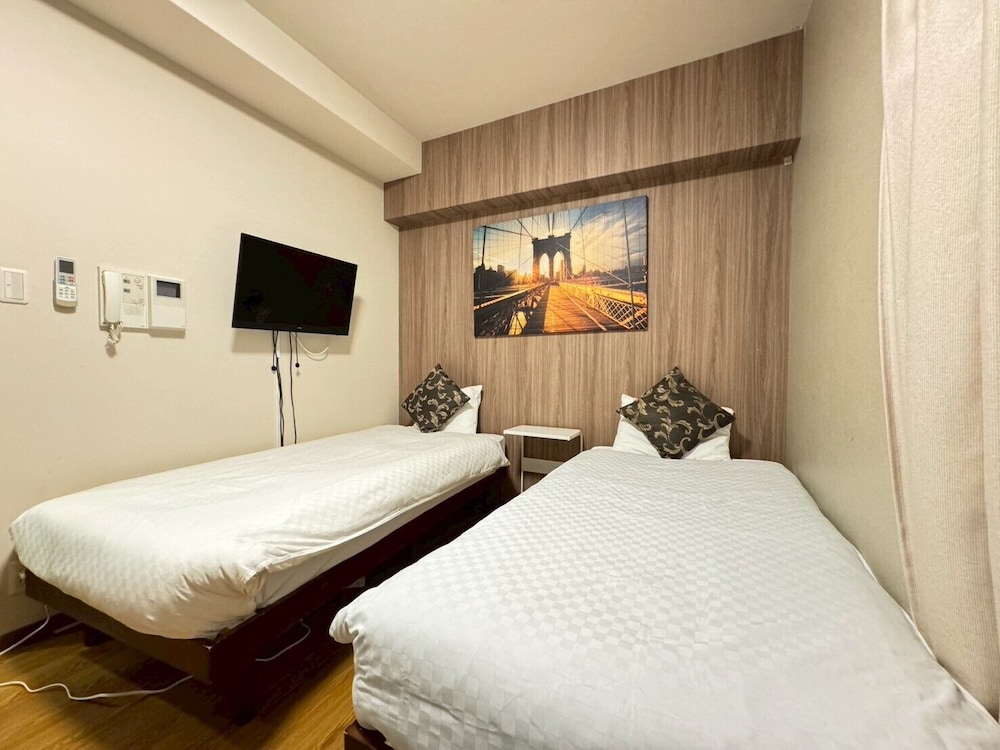 スタンダード トリプルルーム シングルベッド 3 台 禁煙 | さくらサンズホテル