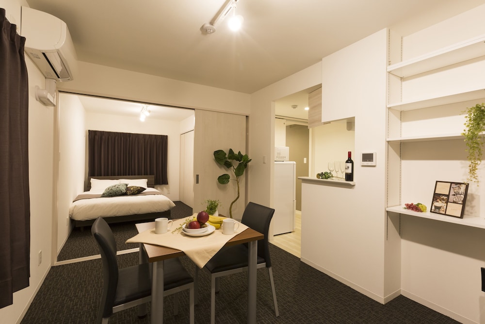 デラックス アパートメント リビング エリア1 | Hotel ONE'S RESIDENCE