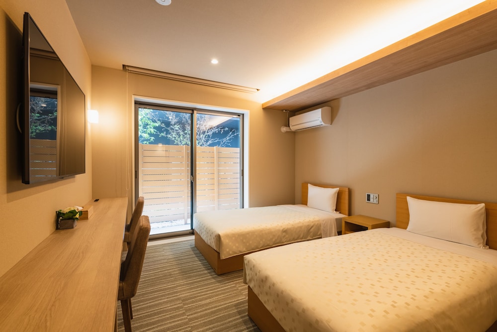 客室1 | GRAND BASE Fukuoka Tenjin