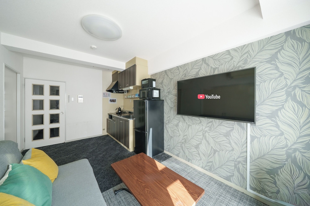 ファミリー アパートメント 禁煙 (601) リビング エリア2 | 88 Matsui Building