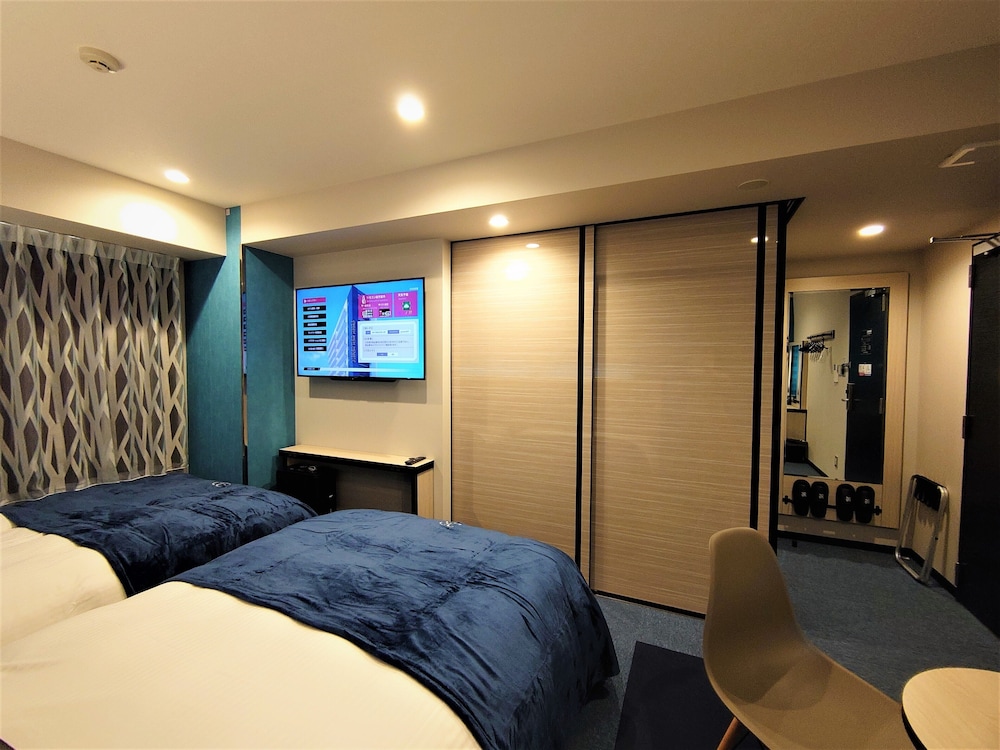 プレミアム ツインルーム ダブルベッド 2 台 禁煙 客室5 | グリーンリッチホテル名古屋錦 人工温泉・二股湯の華