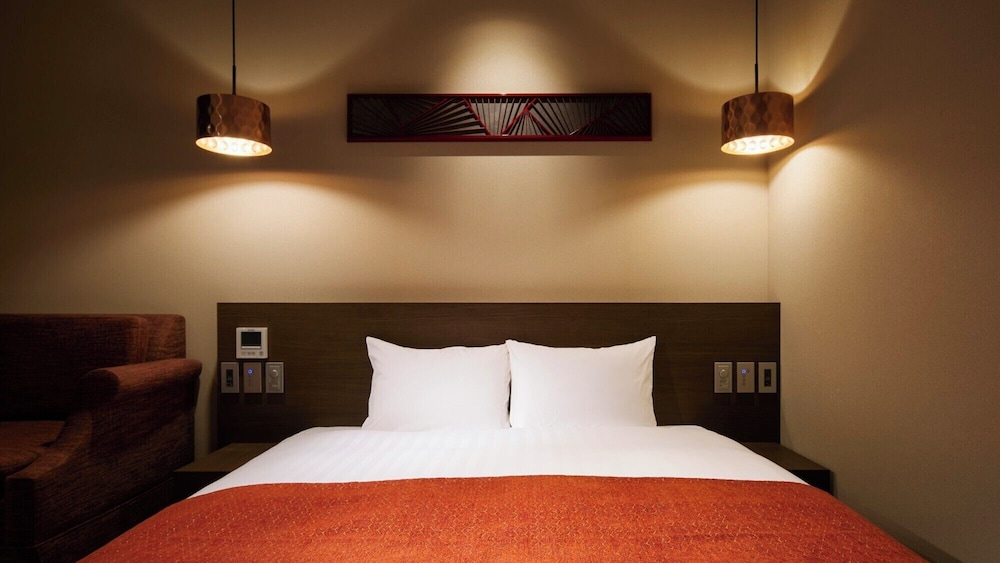 コンフォート ツインルーム クイーンベッド 1 台ソファーベッド付き 禁煙 冷蔵庫 客室2 | Minn 金沢