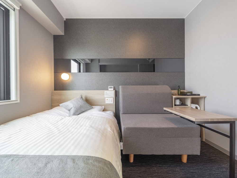 ソファベッド付きルーム 客室1 | スーパーホテル Premier 金沢駅東口