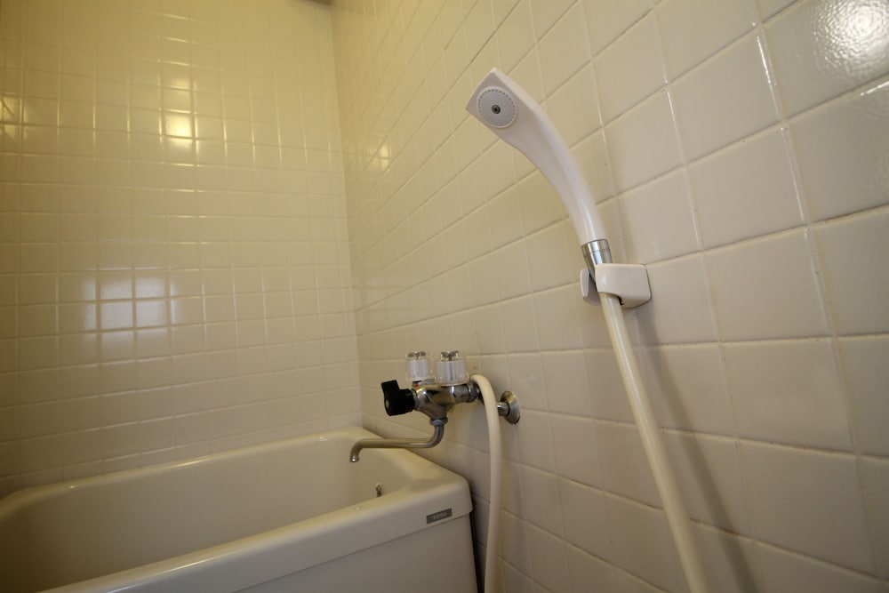 コンドミニアム 1 ベッドルーム (701) 深めの浴槽1 | 第 3 ひまわりビル 701