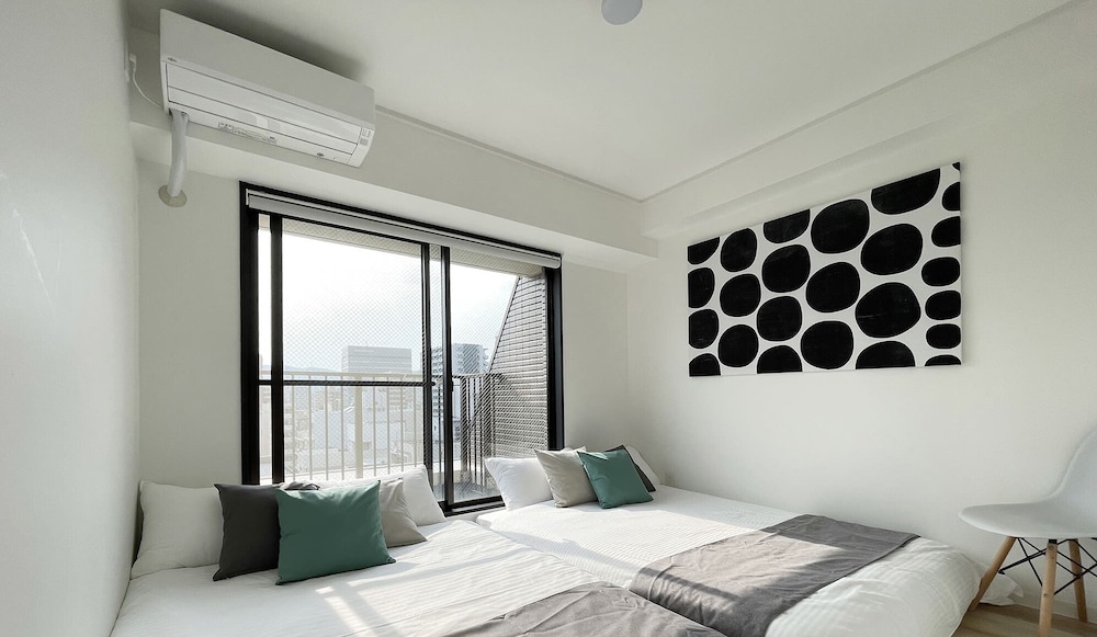 エクスクルーシブ コンドミニアム 4 ベッドルーム (7F) 客室4 | エムズレア本川町