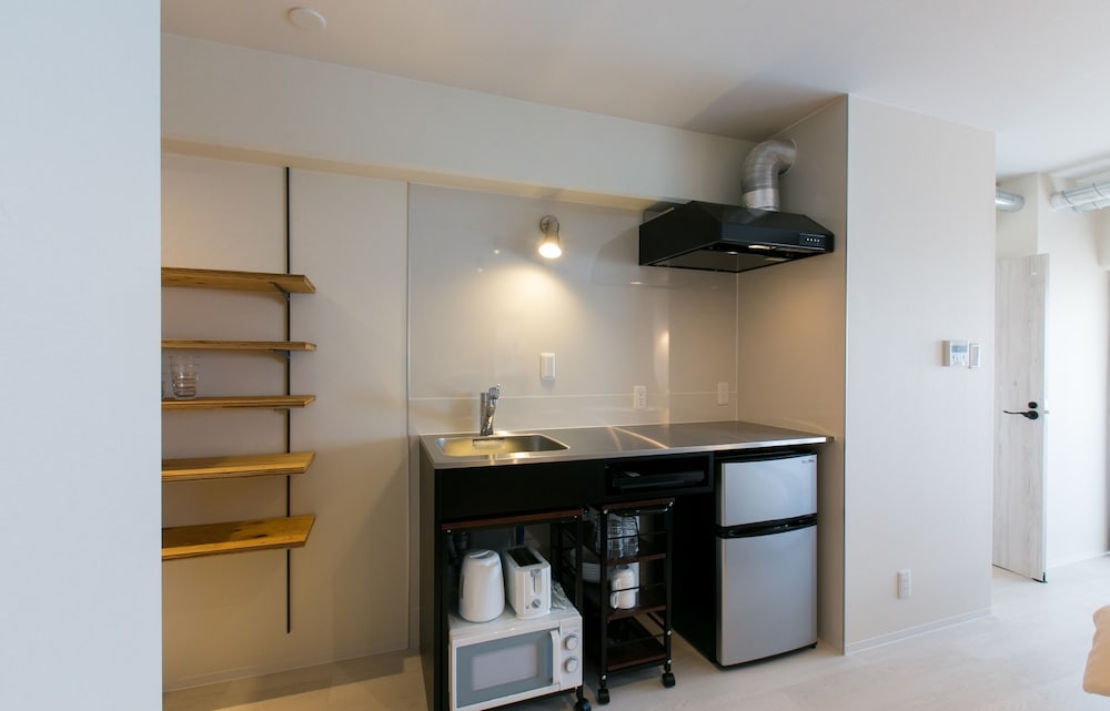 デラックス スタジオスイート (501) 客室4 | ORIGAMINN