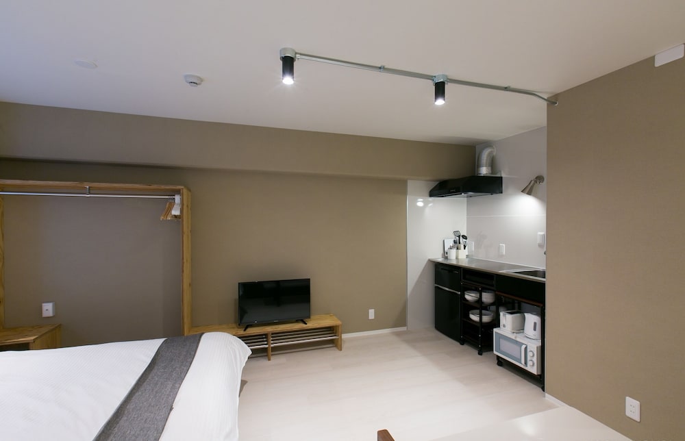 デラックス スタジオスイート (502) 客室2 | ORIGAMINN