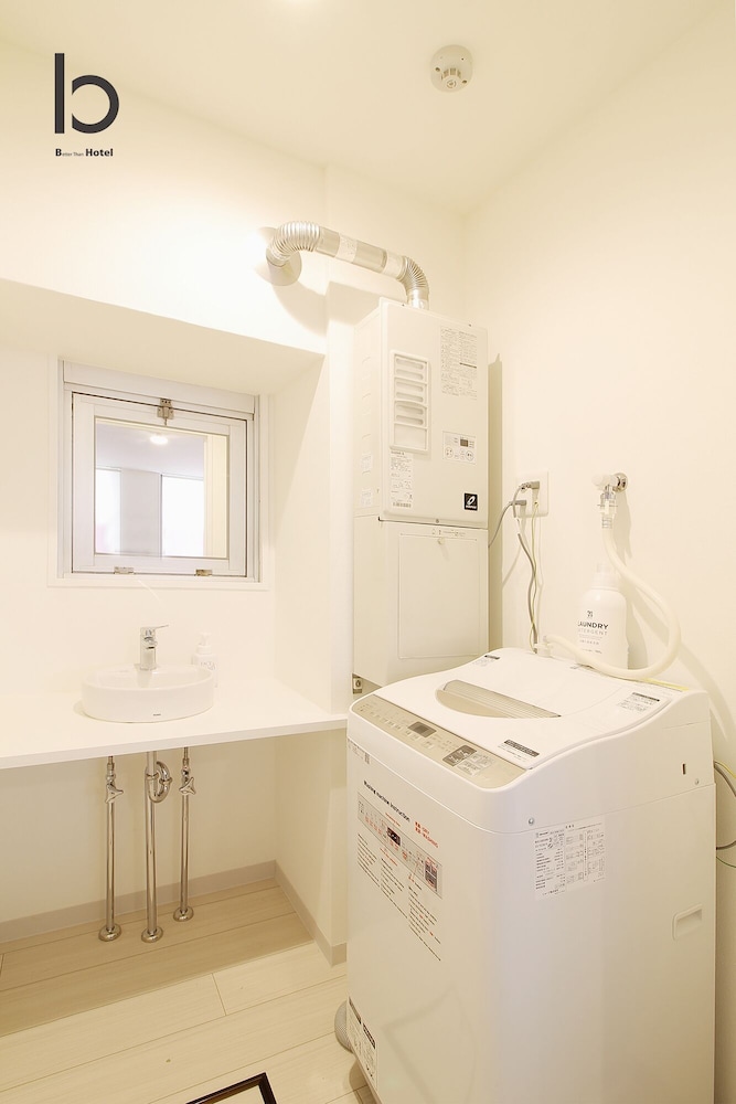 コンフォート スタジオスイート 1 ベッドルーム (102) ランドリー0 | Hanagin Building