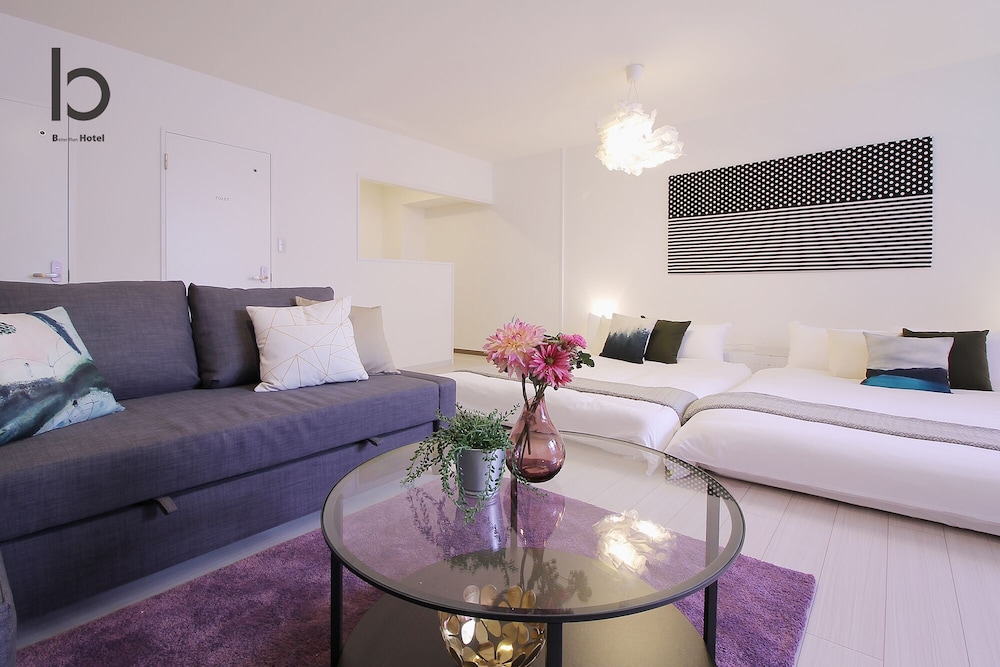 コンフォート スタジオスイート 1 ベッドルーム (102) リビング エリア4 | Hanagin Building