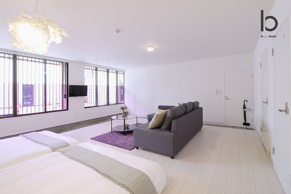 コンフォート スタジオスイート 1 ベッドルーム (102) リビング エリア5 | Hanagin Building