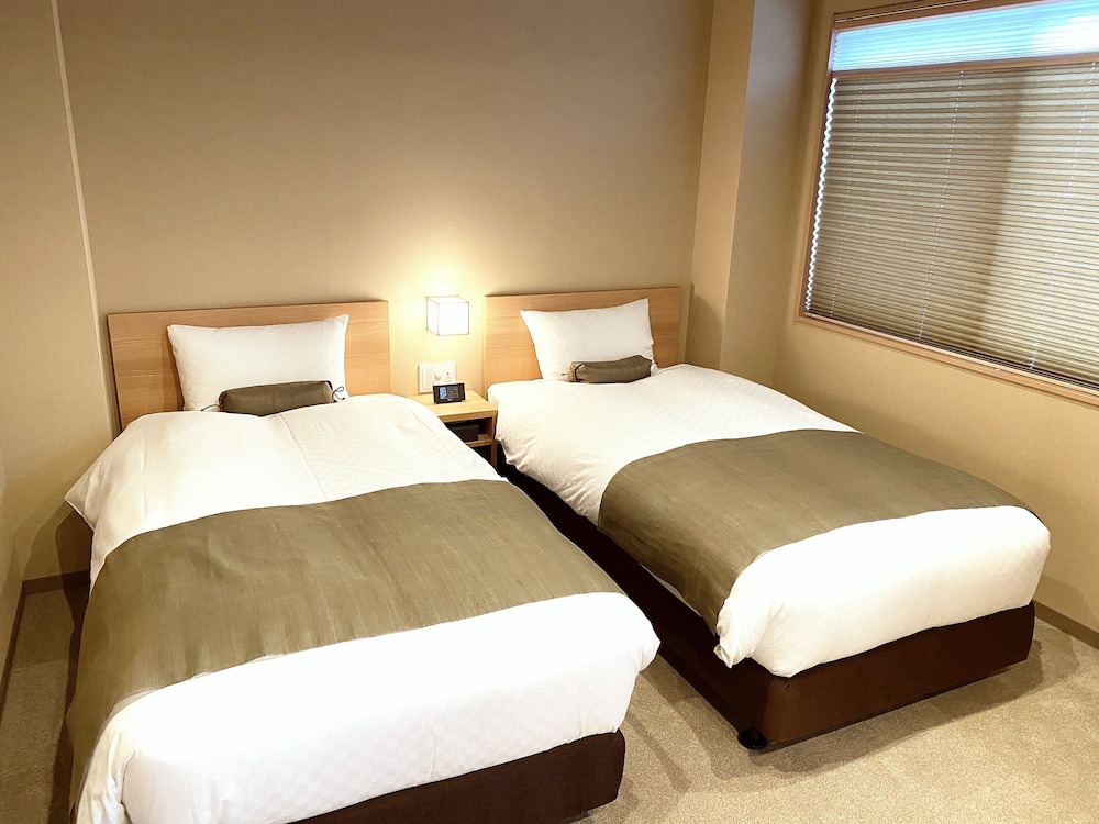 和洋室エコノミーツインルーム 客室2 | Rinn 北御門