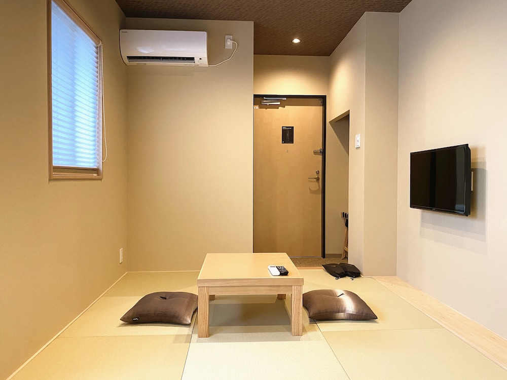 和洋室エコノミーツインルーム リビング エリア0 | Rinn 北御門