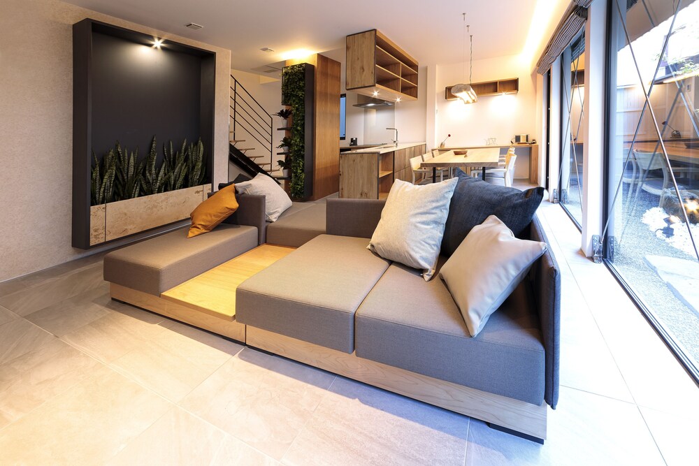 デラックスルーム(2ベッドルーム)禁煙 リビング エリア1 | 石邸 富良野