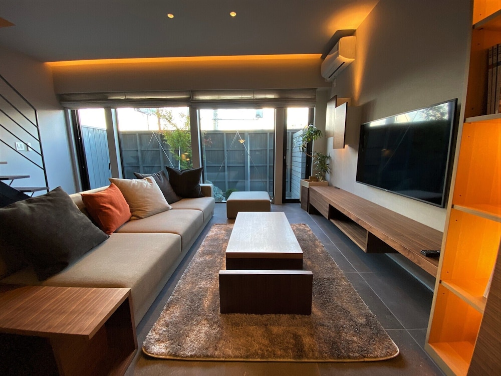 プレミアムルーム(2ベッドルーム)禁煙 リビング エリア1 | 石邸 富良野