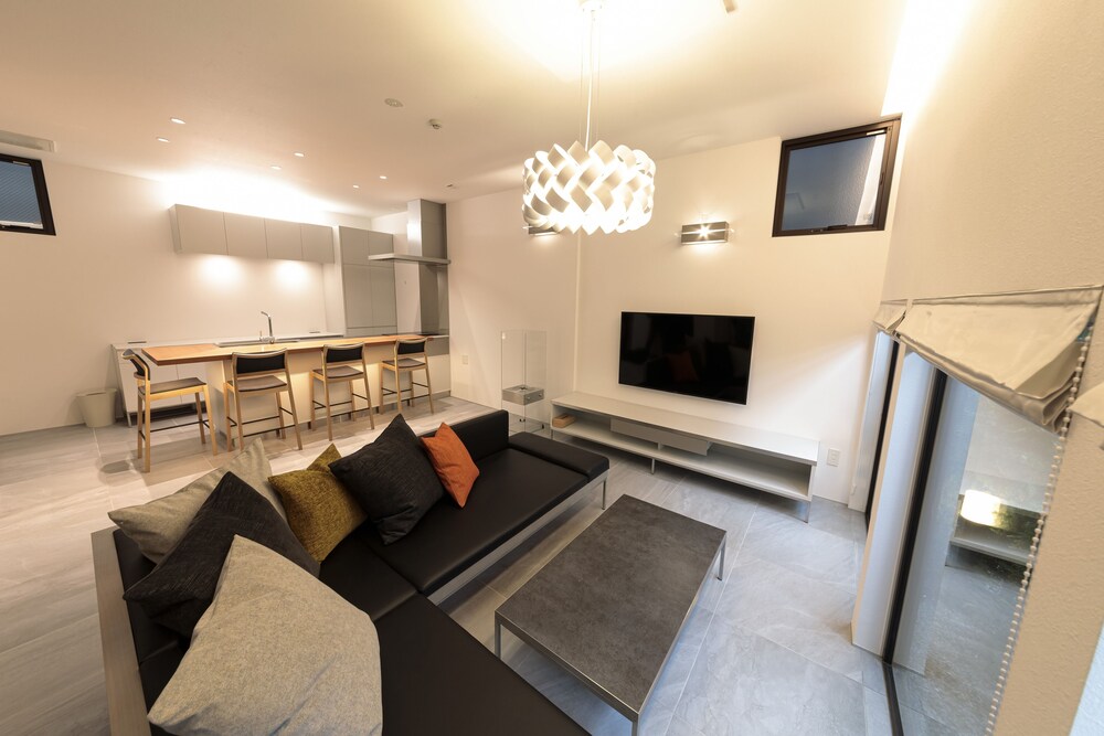 プレミアムルーム(2ベッドルーム)禁煙 リビング エリア1 | 石邸 富良野