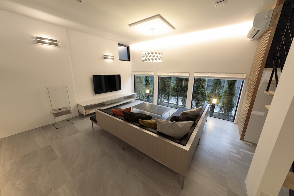 プレミアムルーム(2ベッドルーム)禁煙 リビング エリア0 | 石邸 富良野