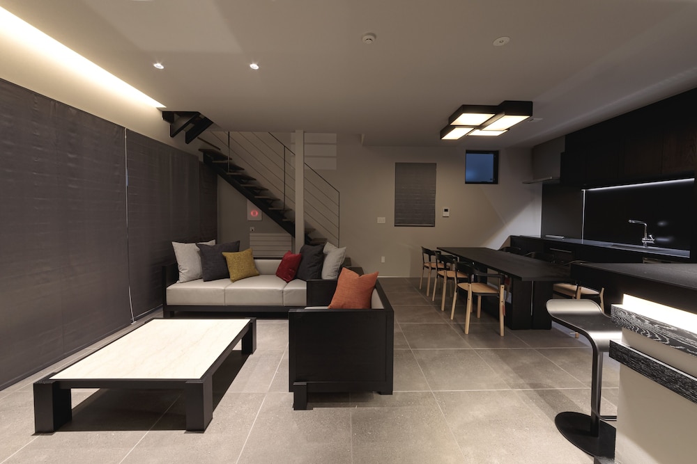 スーペリアルーム(2ベッドルーム)禁煙 リビング エリア3 | 石邸 富良野