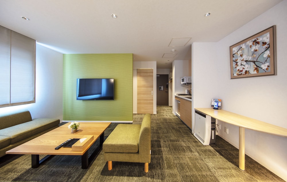 デラックスF 禁煙 リビング エリア1 | グランドベース岡山駅前