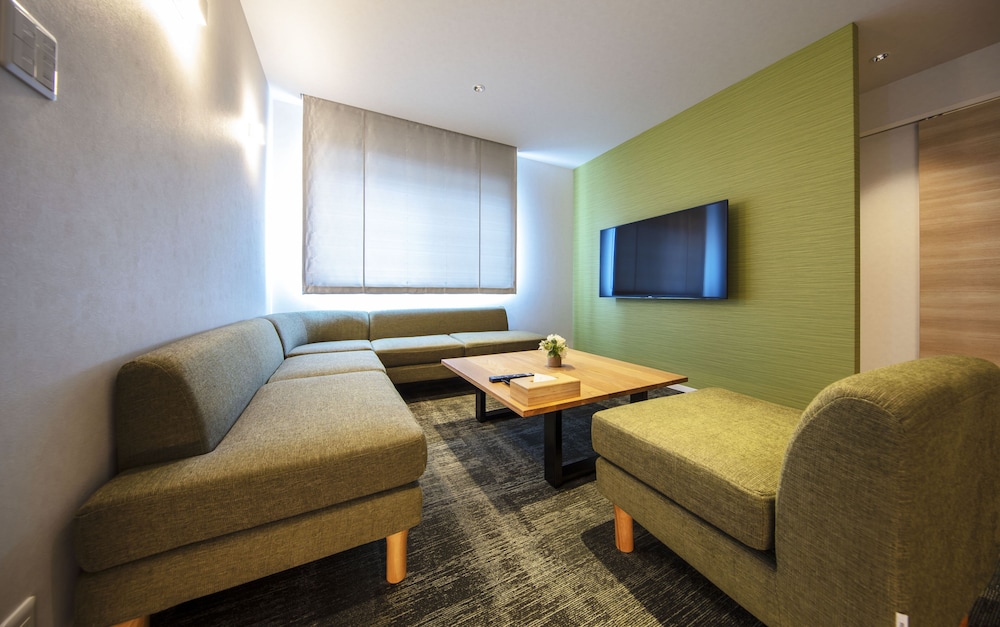 デラックスF 禁煙 リビング エリア0 | グランドベース岡山駅前