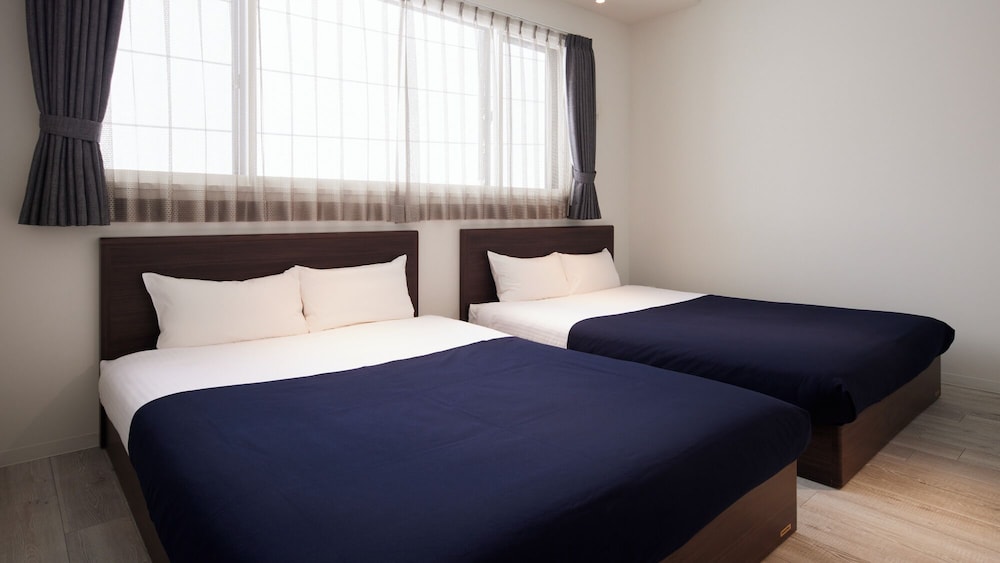 スーペリアファミリー 2LDK 客室1 | Minn 千歳