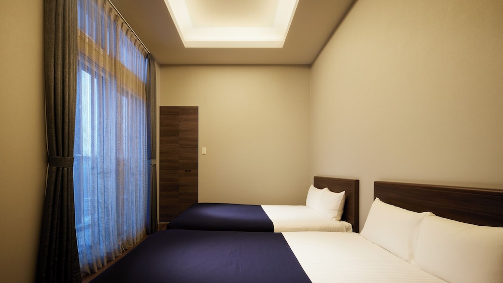 デラックスルーム 3LDK 施設の正面2 | Minn 千歳