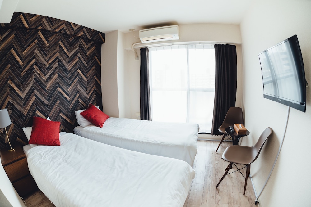 客室1 | ロイヤルハイツ桜川コンドミニアム