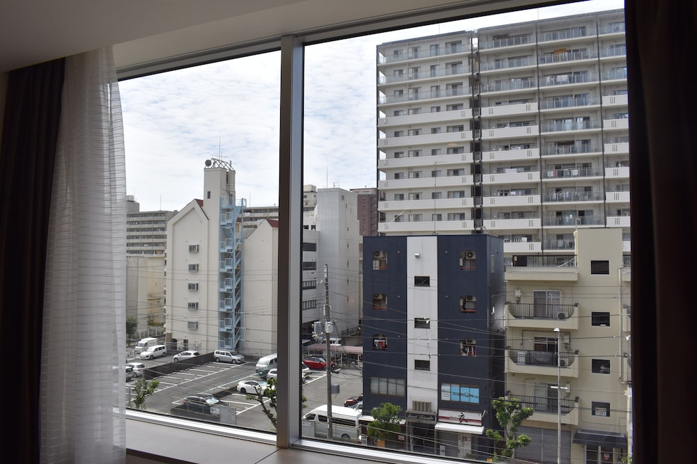 スイート キングベッド 1 台 シティビュー シティ ビュー0 | ホリディ・イン & スイーツ新大阪 by IHG