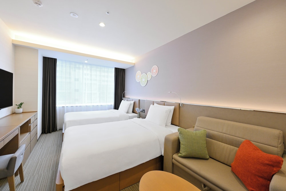 スイート シングルベッド 2 台 | ホリディ・イン & スイーツ新大阪 by IHG