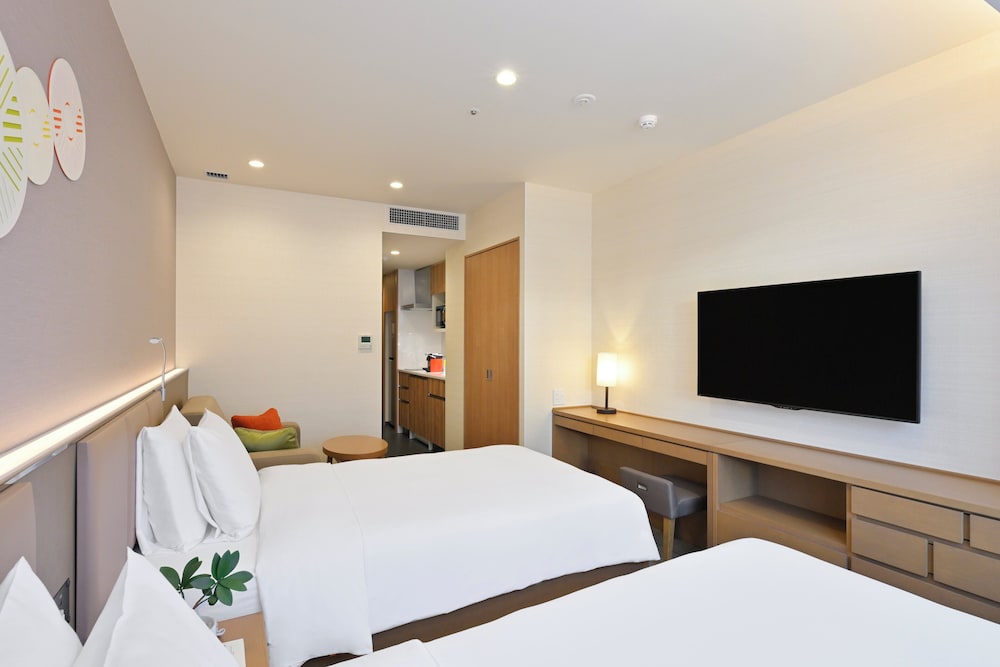 スイート シングルベッド 2 台 客室3 | ホリディ・イン & スイーツ新大阪 by IHG