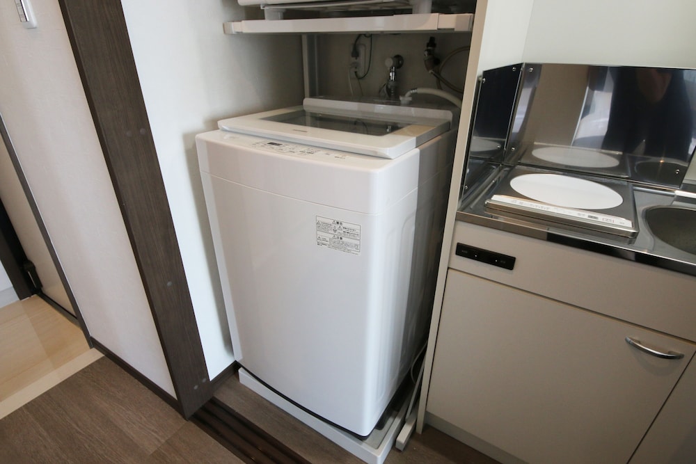 スタンダード ツインルーム ダブルベッド 2 台 ランドリー1 | さくらや