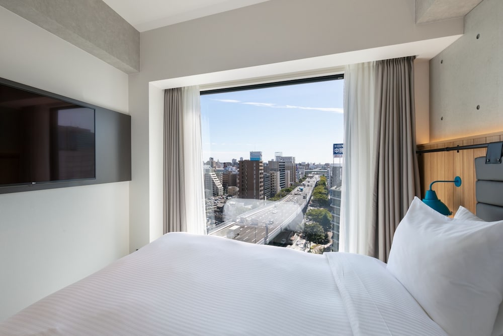 スタンダード ルーム ダブルベッド 1 台 禁煙 シティ ビュー0 | イビススタイルズ名古屋