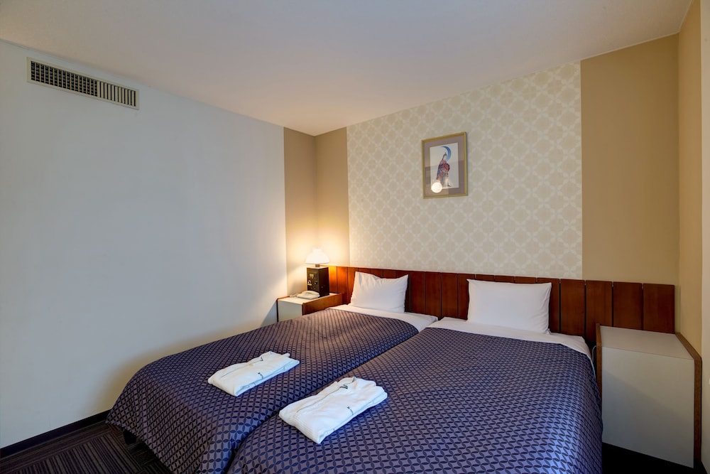 ツインルーム シングルベッド 2 台 客室4 | ホテル タイラ