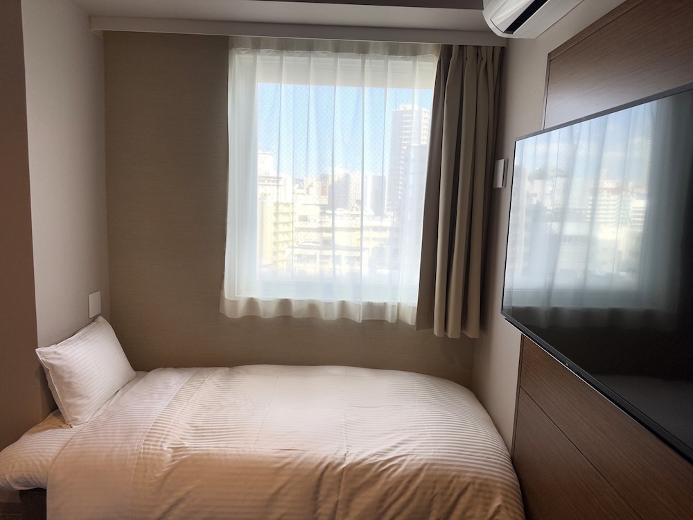 スーペリアツインルーム 禁煙 (大人3名利用時のみシングルソファーベッド1台、大人4名利用時のみシングルソファーベッド2台が付きます) 客室7 | ホテルパームロイヤルリゾート国際通り