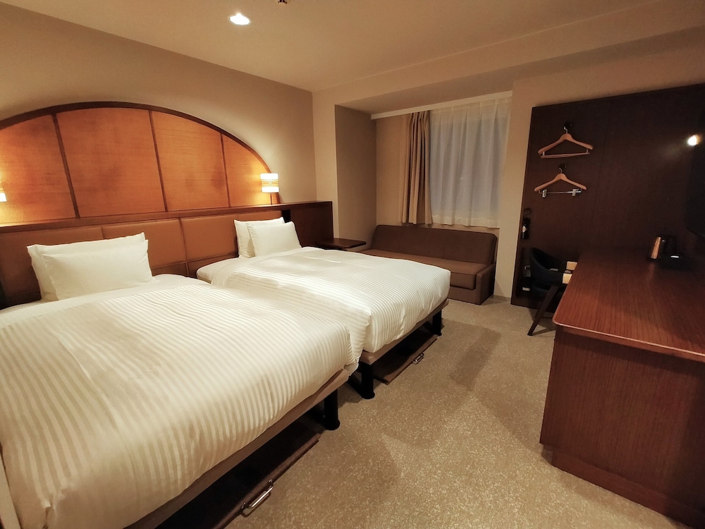 グランドツインルーム　禁煙 (大人3名利用時のみシングルソファーベッド1台が付きます) 客室2 | ホテルパームロイヤルリゾート国際通り